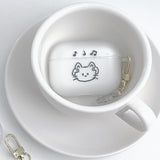 Cat with AirPods on Airpods case + charm