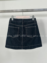 a raw paper stitch jean skirt