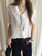 Cascade ruffle blouse
