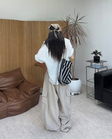 Penan striped shoulder bag