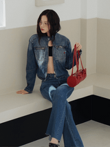 Round medium blue zip-up denim jacket