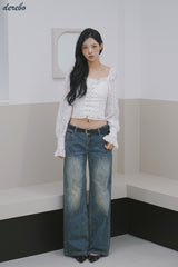 daisy punching strap frill blouse