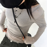 Nowell ハートカッティングシースルーテンセルウェーブUネック長袖Tシャツ