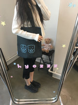 Guinea reversible shoulder bag