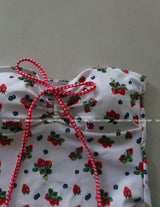 a strawberry tube top bikini