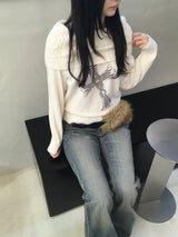 Cross off shoulder knit