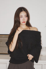 Chic black unbalanced off-shoulder knitwear