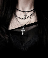 black cross layered necklace