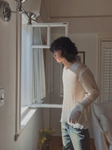 Reverse damage V-neck knitwear