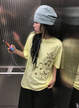 コゲ スター ミュージカル ノート プリンティング ルーズフィット ショートスリーブ ティー