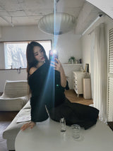 Chic black unbalanced off-shoulder knitwear
