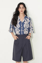Wool blend short pants with pleated and segmented flat pocket design