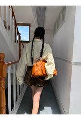 a forsythia striped loose-fit shirt