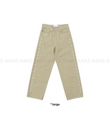 スタッドラインパンツ
