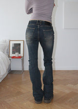 CURVED SLIM BOOTS CUT DENIM