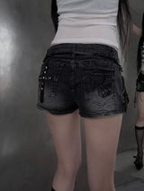 cross studded black denim shorts