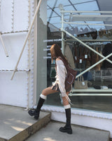 Low check button skirt