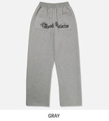 アークレタリングエンブロイダードブラッシュドオーバースウェットパンツ