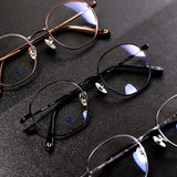 Knouun Round titanium glasses CODE. 101. A Black