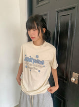ネジュ プリンティング ルーズフィット ショートスリーブ ティー