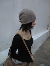roll up string beanie