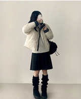 Bomi A-line pleated check midi skirt 