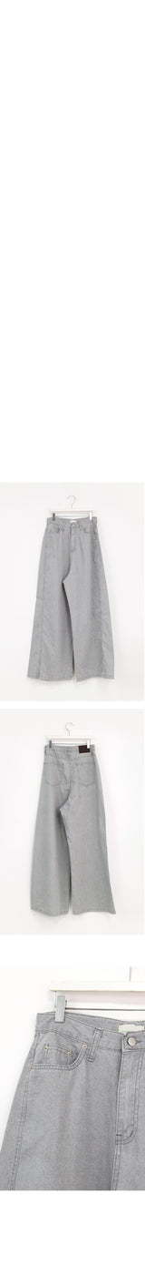 over wide gray pants