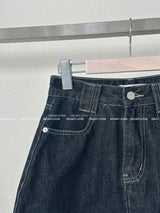 a raw paper stitch jean skirt