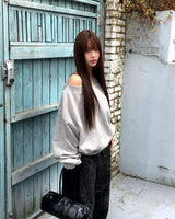 Neuru Oversized Off-Shoulder Studded Brushed Sweatshirt