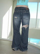 walk destroyed jeans