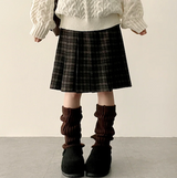 Bomi A-line pleated check midi skirt 