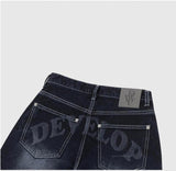 Edge Backprint Wide Denim Pants