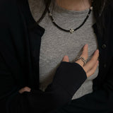 black cross necklace