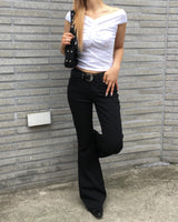 Black stitch boots cut pants