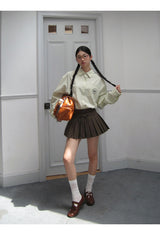 a forsythia striped loose-fit shirt