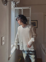 Reverse damage V-neck knitwear
