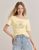 ダイアサマーヴィンテージグラフィックシャーリングワンショルダーTシャツ バター