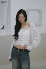 daisy punching strap frill blouse