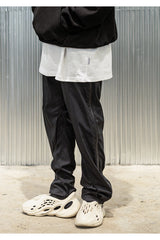 オブリークスリットジップパンツ / OBLIQUE SLIT ZIP PANTS