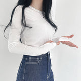 エクステンデッドスリーブラウンドネックTシャツ
