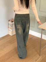 Pale hip lettering washed wide denim pants