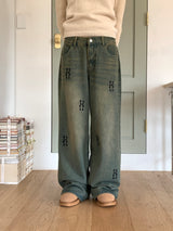 Pale hip lettering washed wide denim pants