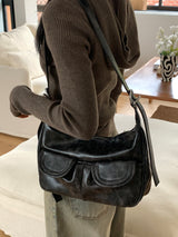 Unbarred two-pocket vintage washed leather shoulder bag