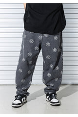 スマイルパターンデニムパンツ/SMILE PATTERN DENIM PANTS (BLACK)