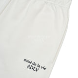 BASIC LOGO NEEDLEWORK SWEAT PANTS CREAM 