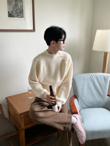 シェルボタンニット