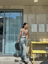 Belted light blue bootcut denim pants