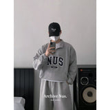 Huke x Nus. half zip-up