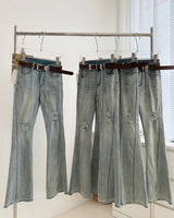 Belted light blue bootcut denim pants