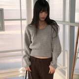 Bien off-shoulder two-way button slit V-neck long sleeve knit